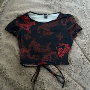 Shein crop top with dragons on it. Color red and black. Size XS.